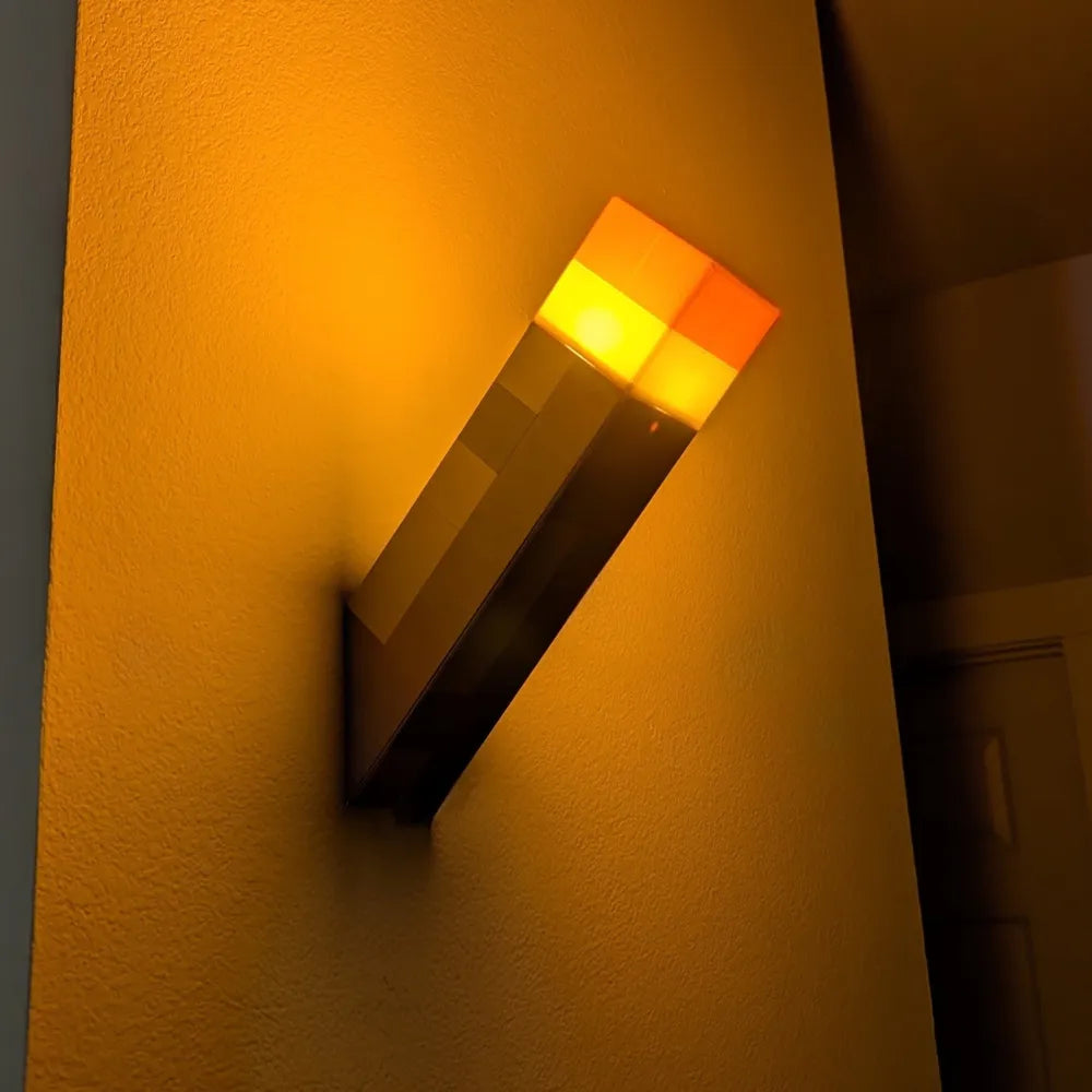 Minecraft-Inspired Wall Torch Lamp – LED Pixel Style Wall Mounted Light, Gaming Room Decor, USB Powered Ambient Night LightMinecraft-Inspired Wall Torch Lamp – LED Pixel Style Wall Mounted Light, Gaming Room Decor, USB Powered Ambient Night Light